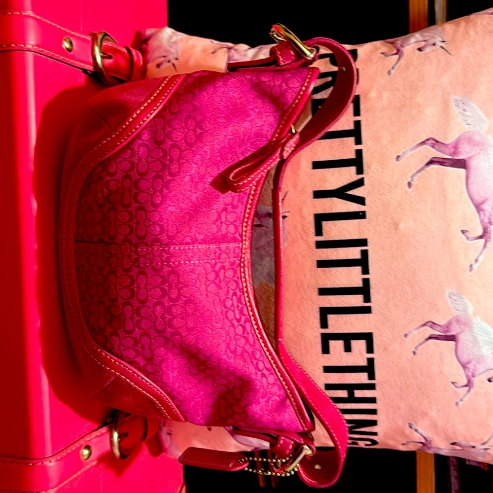 Cute just like new pick small cute coach bag for on the go.